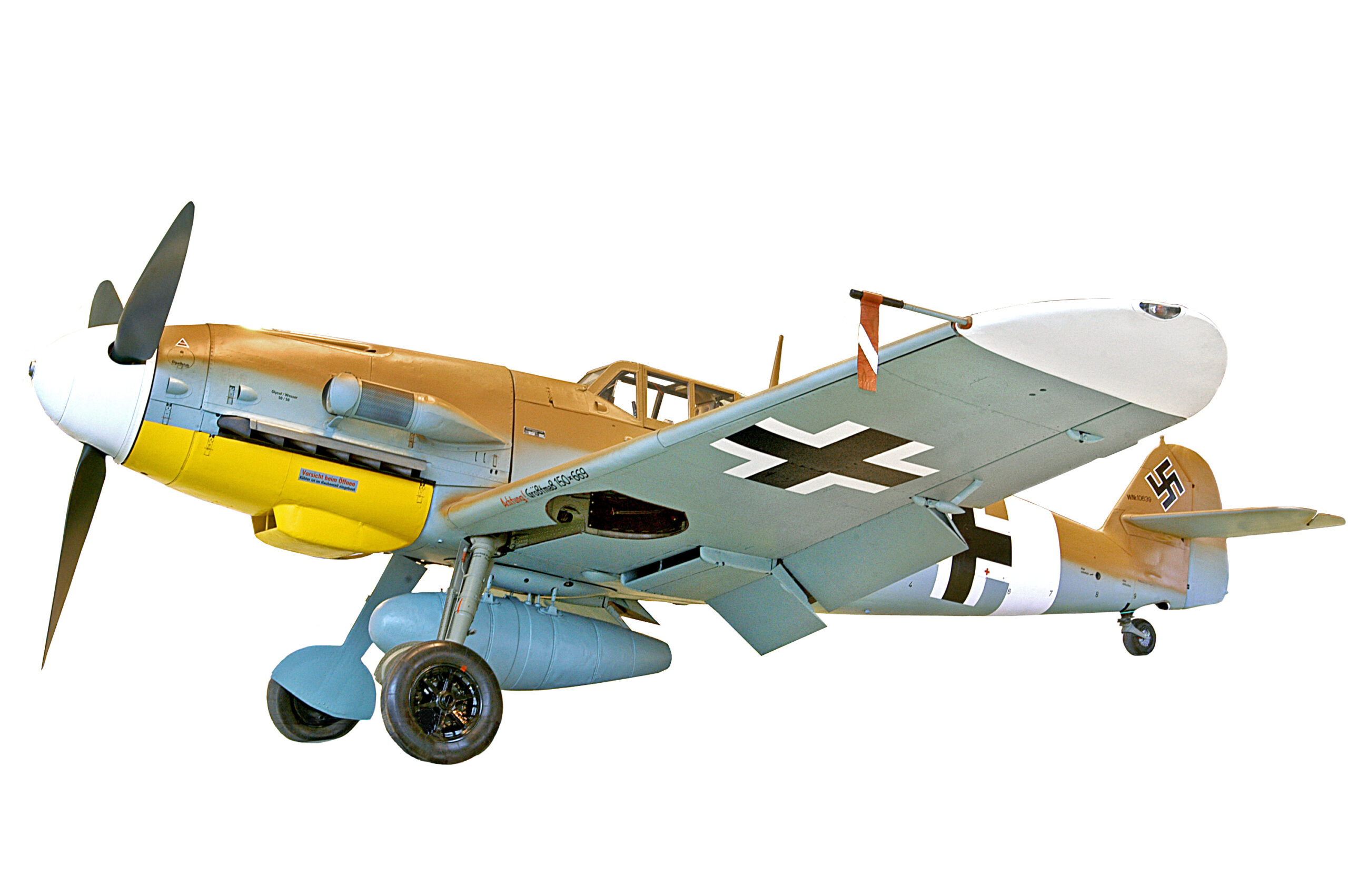 Single engine aircraft with propeller and yellow nose and grey body