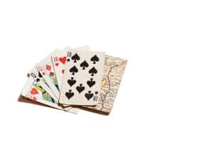 Incomplete (29) set of playing cards. Two cards, the ten of Spades and Jack of Clubs contain a secret map.