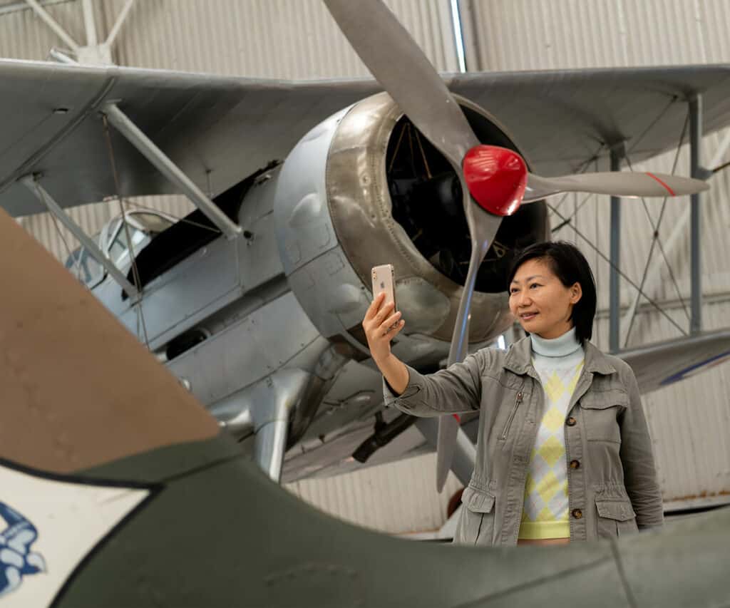 Woman taking Selfie with Spitfire