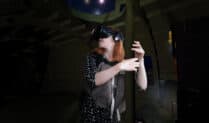 A woman uses VR technology