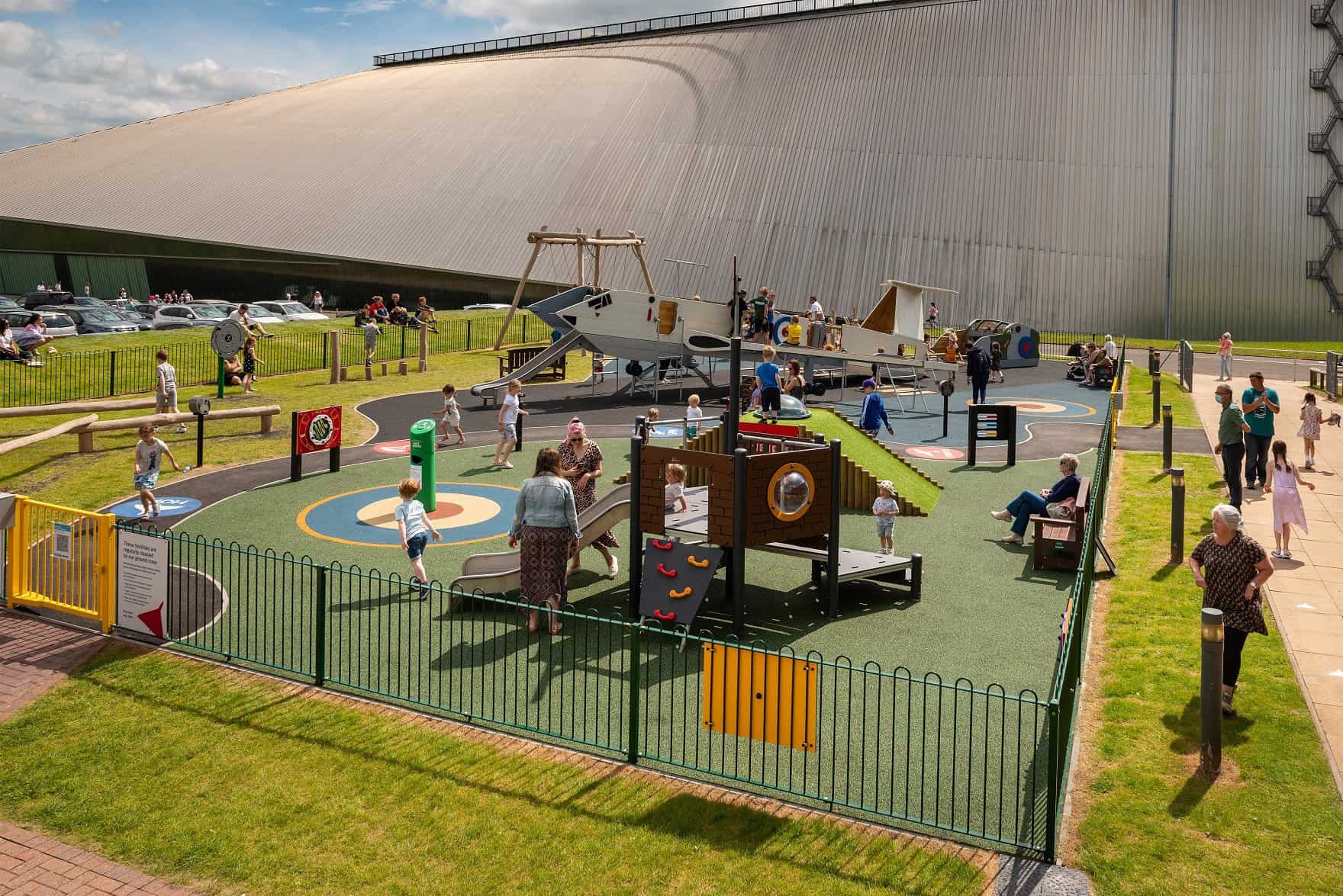A view of the Kids playing on an Airfield themed playground at RAF Museum Midlands