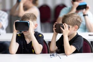 2 boys with headsets 