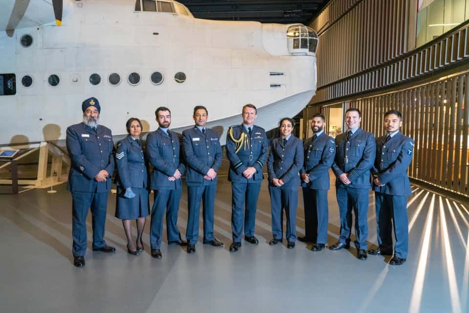 RAF Serving Personnel, standing in front of London's Short Sunderland Flying Boat