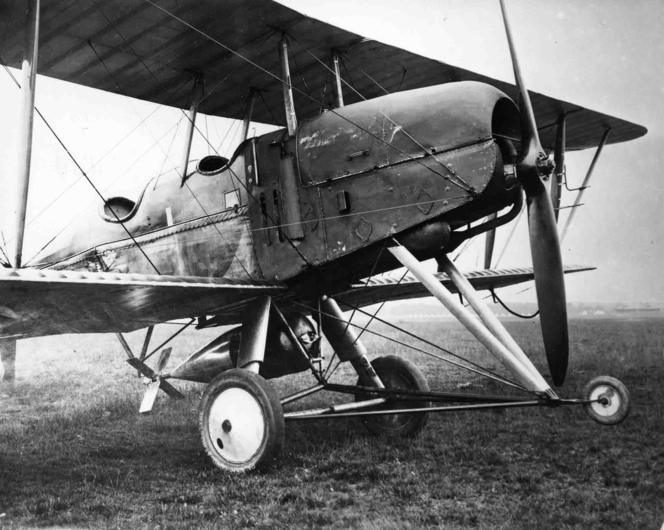 RE 5 at Farnborough 1914. Note early trial with bomb and also wheeled skid to prevent aircraft 'nosing-over' when landing on soft ground (RAF Museum X003-2602-11214)