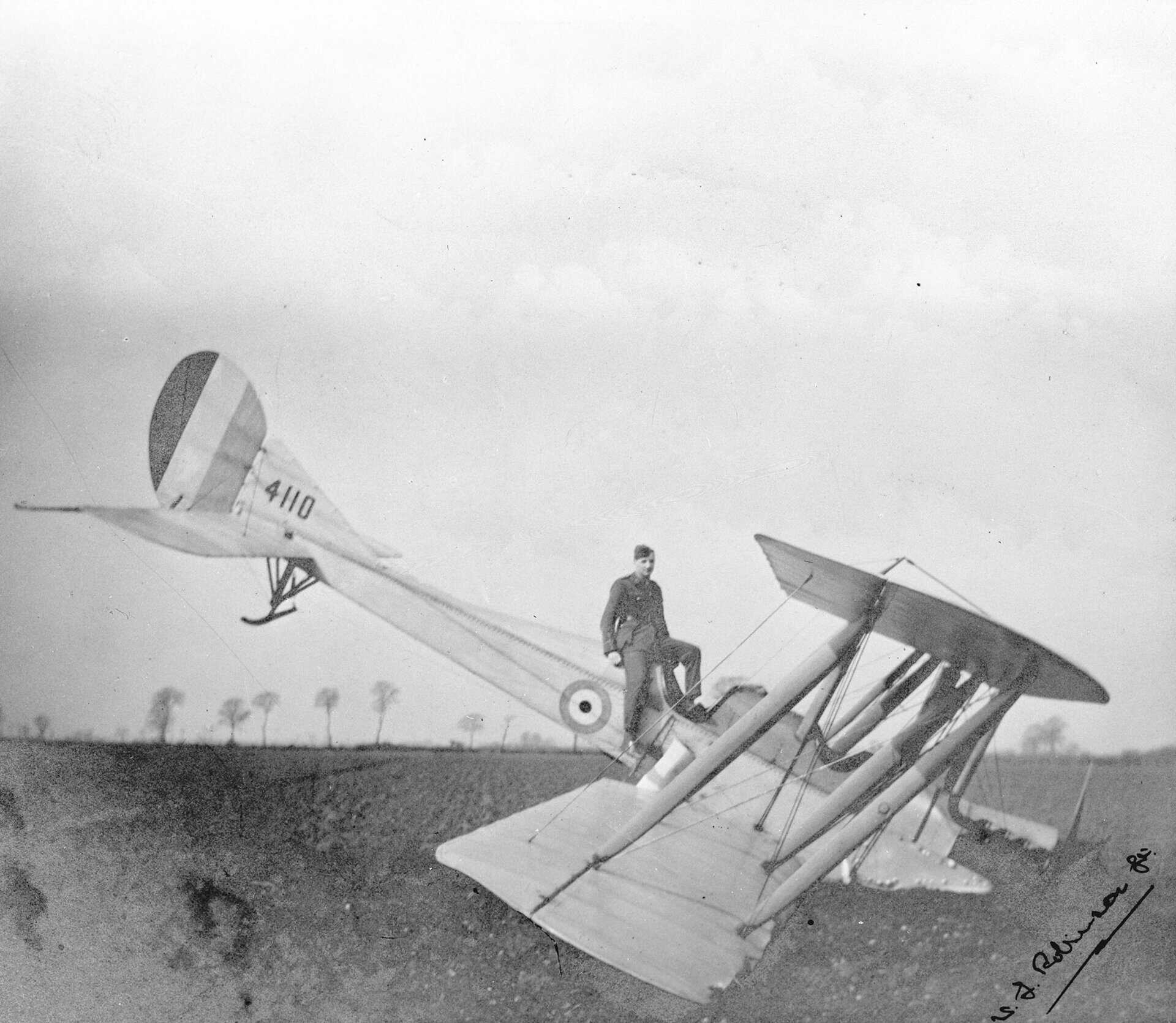 Royal Aircraft Factory BE2c of 39 Squadron: Robinson seated on fuselage (RAF Museum P016569)
