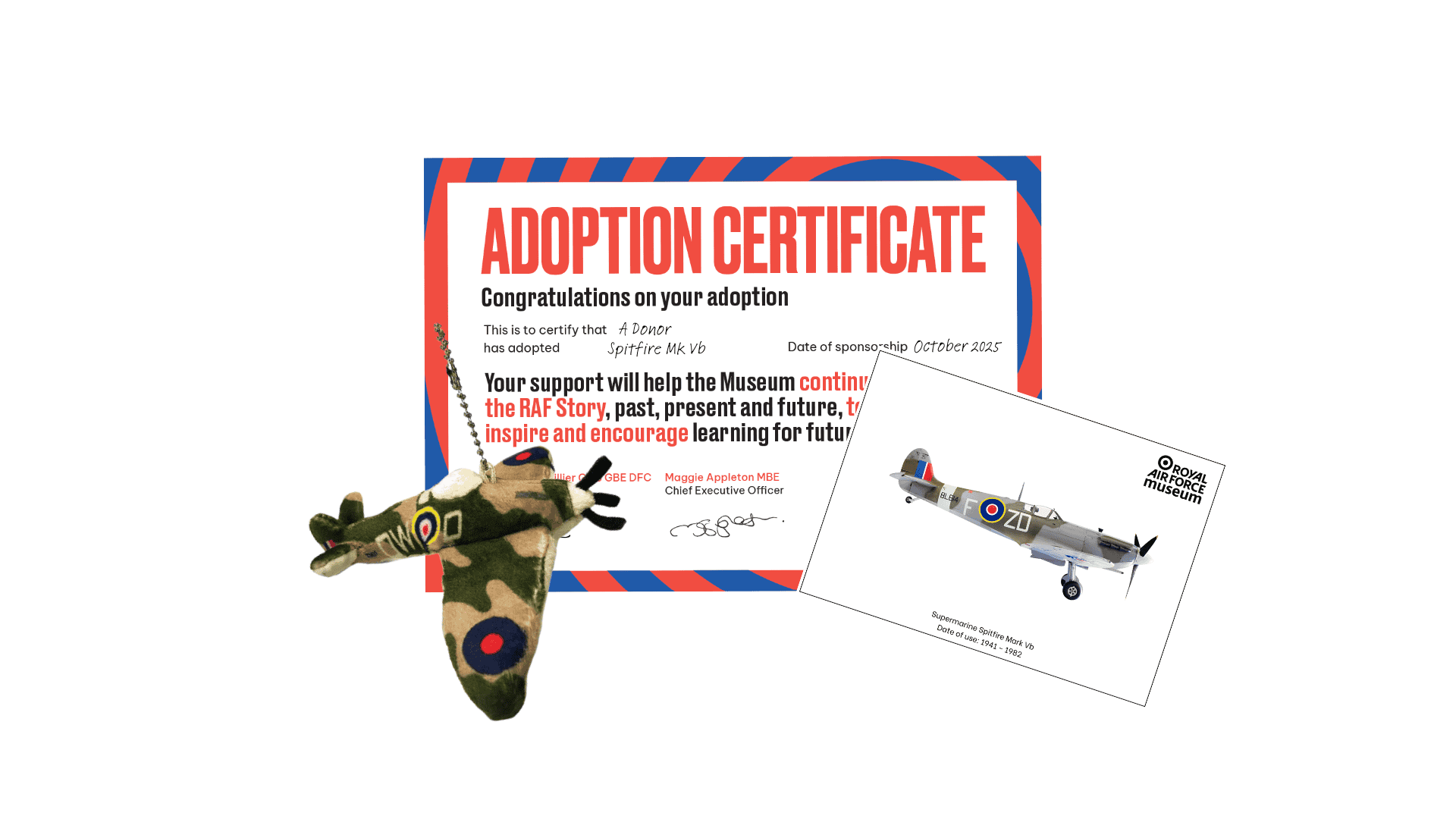 A red and blue adoption certificate next to a soft toy keyring of a spitfire and a postcard with an image of a Spitfire