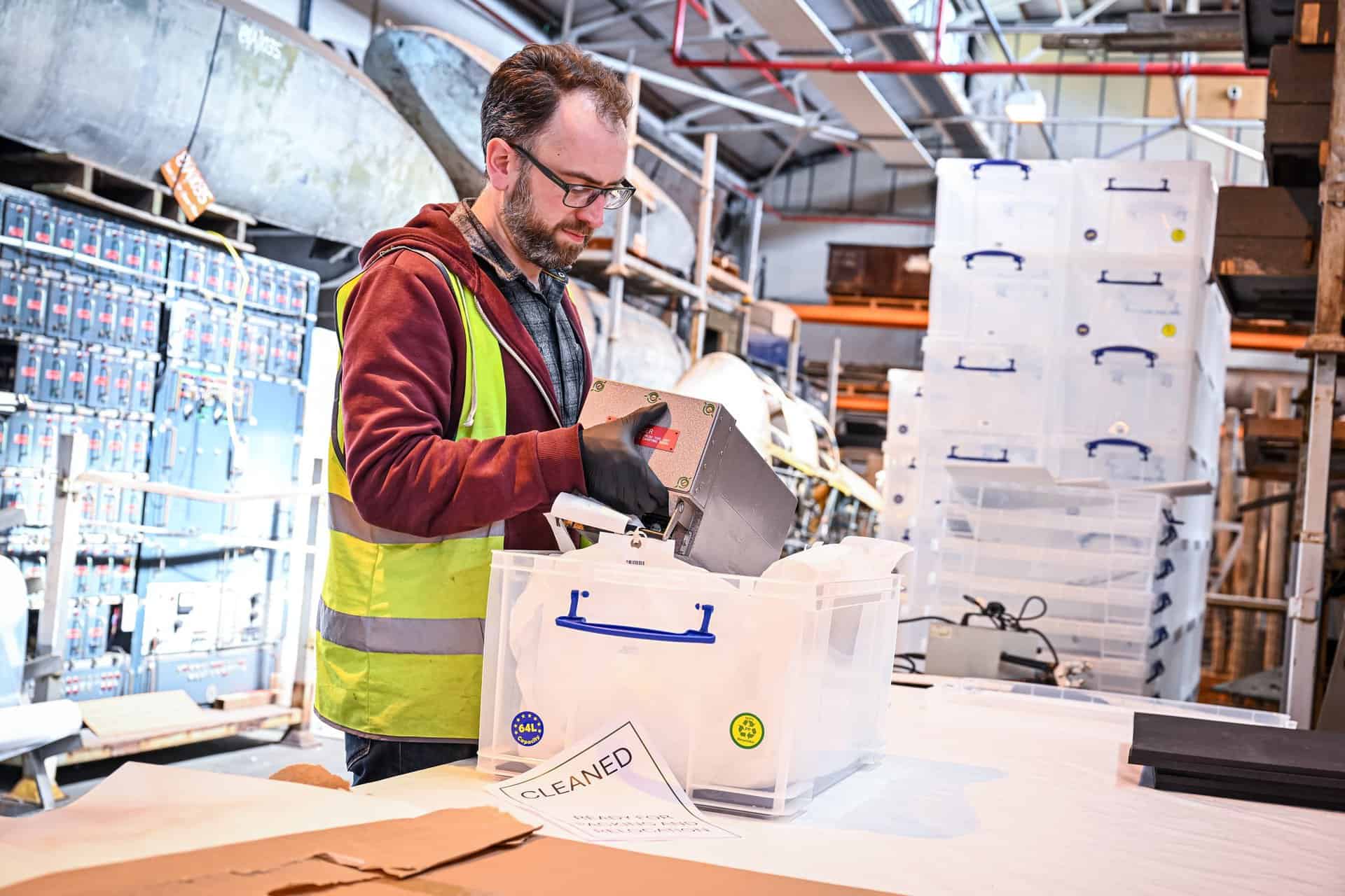 An artefact being carefully packed by one of our volunteers for transportation to our new collections hub in the Midlands
