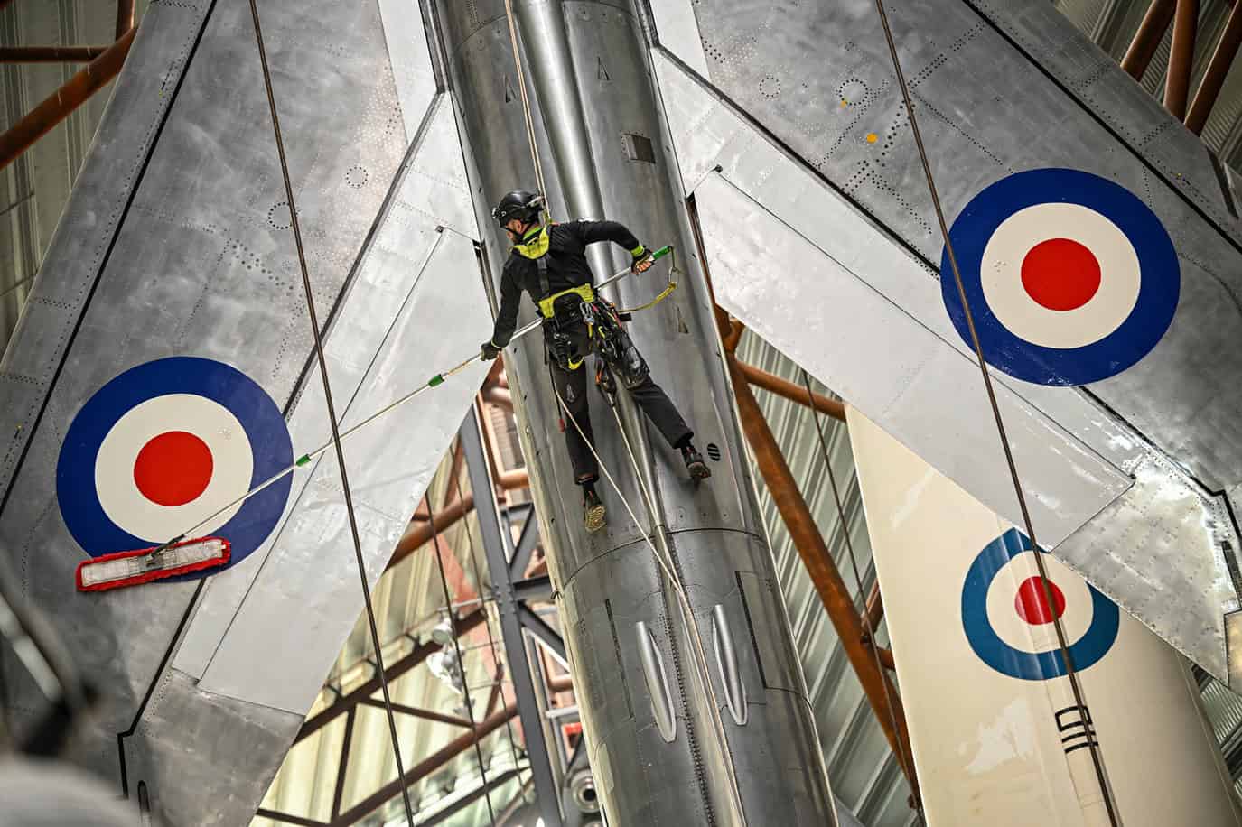 Dustbusters take to the rafters for daring aircraft clean