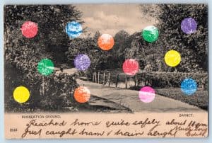 A black and white postcard with a photograph of a recreation ground in Barnet. Multicoloured polka dots have been added on top of the image.