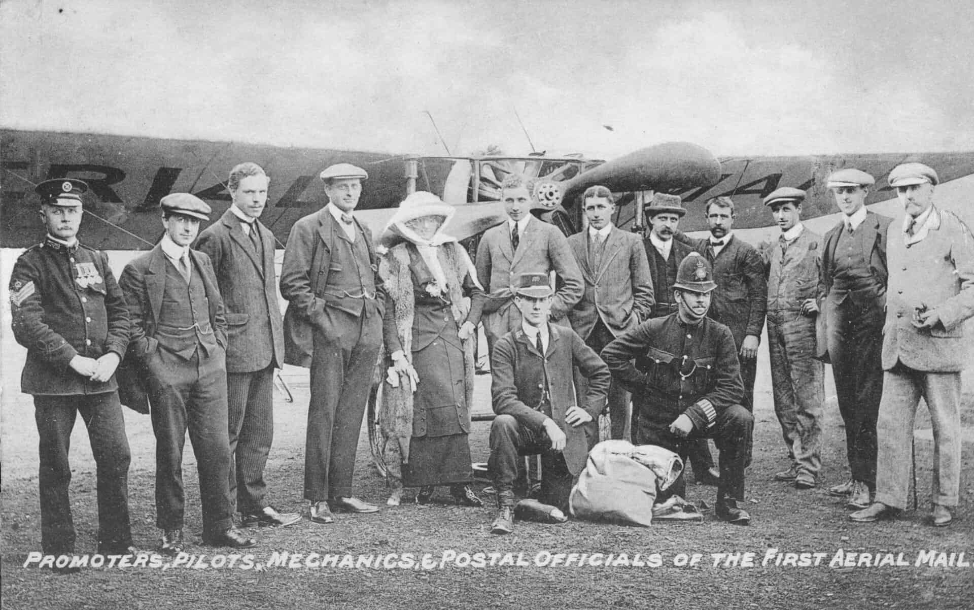 A black and white image showing the men and women involved in the first Royal Mail by Air flight